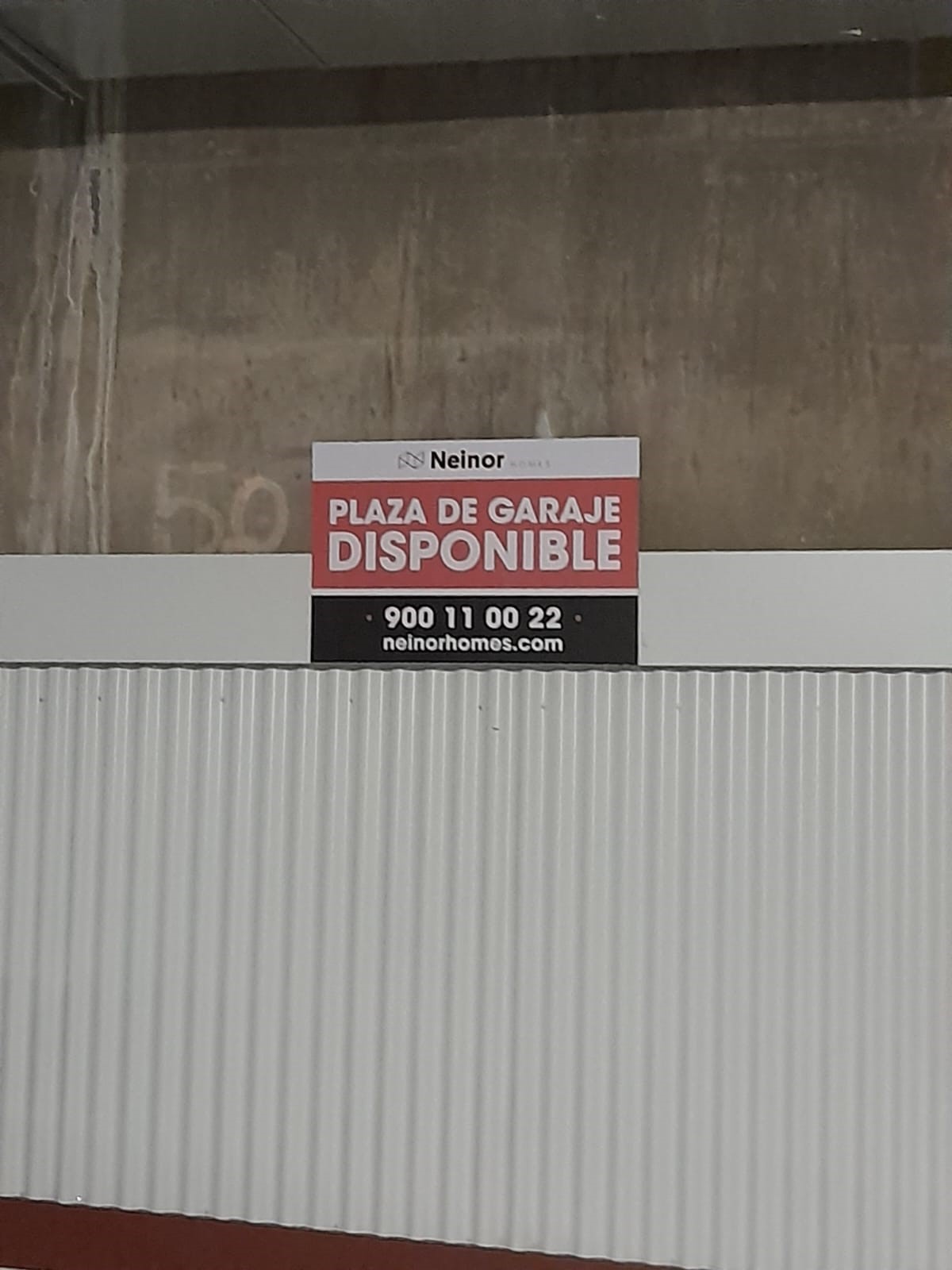 Producción y montaje de carteles para Neinor en garaje Alcobendas