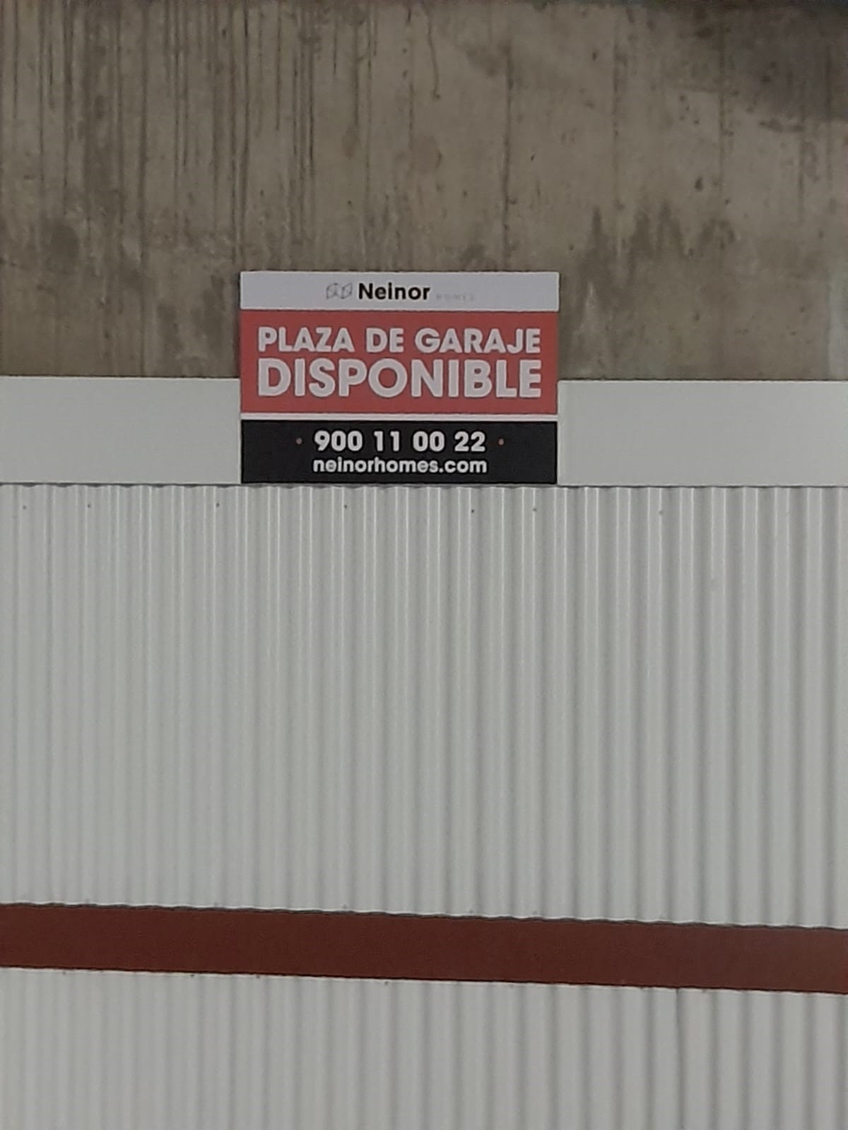 Producción y montaje de carteles para Neinor en garaje Alcobendas